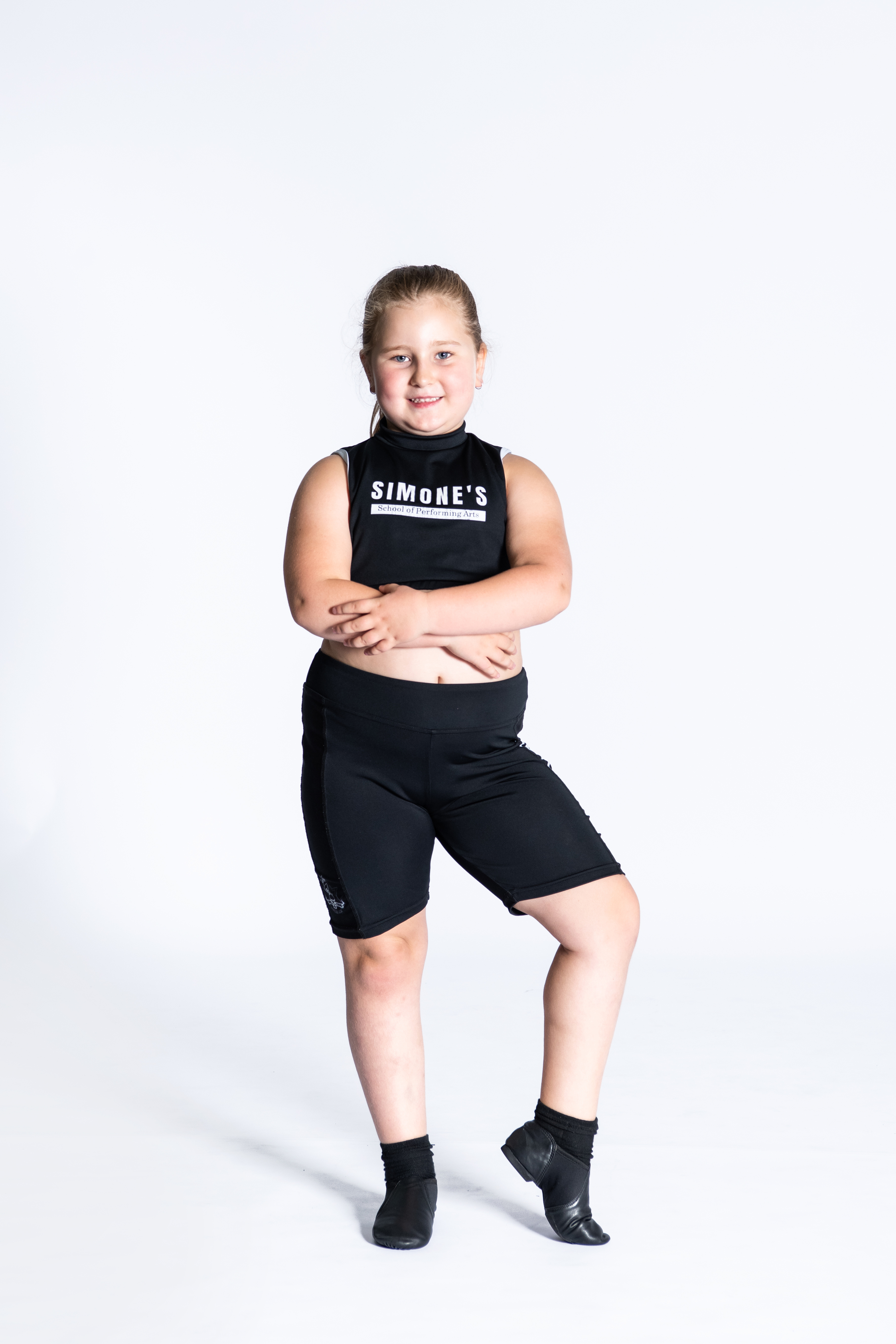 A student at Simone's School of Performing Arts participates in a dance class, showcasing creativity and expression. "Encouraging Creativity: How Dance Helps Kids Think Outside the Box" - Explore how our dance programs foster creative thinking, expression, and critical thinking skills. Keywords: kids dance classes, creative growth, dance for children, Simone's School of Performing Arts.