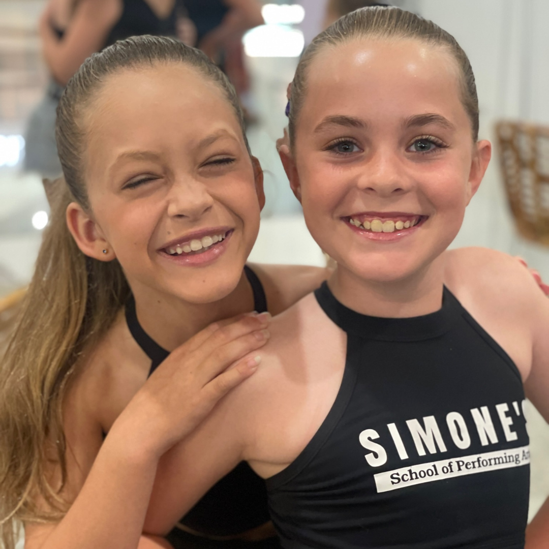 Students at Simone's School of Performing Arts enjoy dance classes, highlighting the physical and mental benefits of dance for kids. Title: Healthy Bodies, Happy Minds: Physical and Mental Benefits of Dance for Kids. dance classes for kids, physical fitness, mental well-being, Simone's School of Performing Arts.