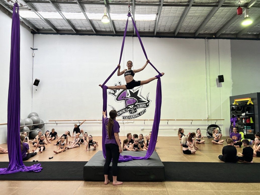 Student from Simone's School of Performing Arts in Berkeley Vale showing off her new silk skills
